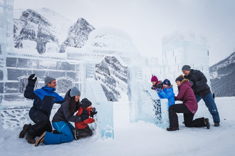 family having snowball fight lake louise ice magic event
